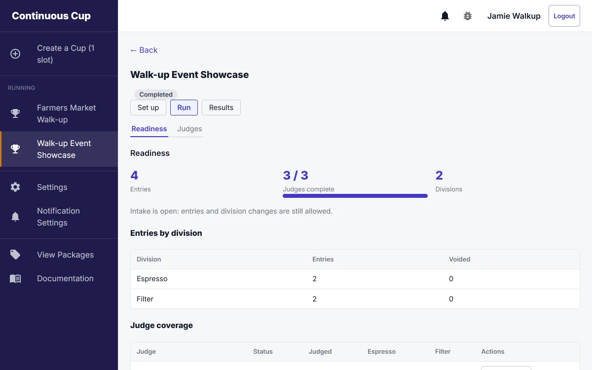 Walk-up check-in screen with divisions and live entry counts